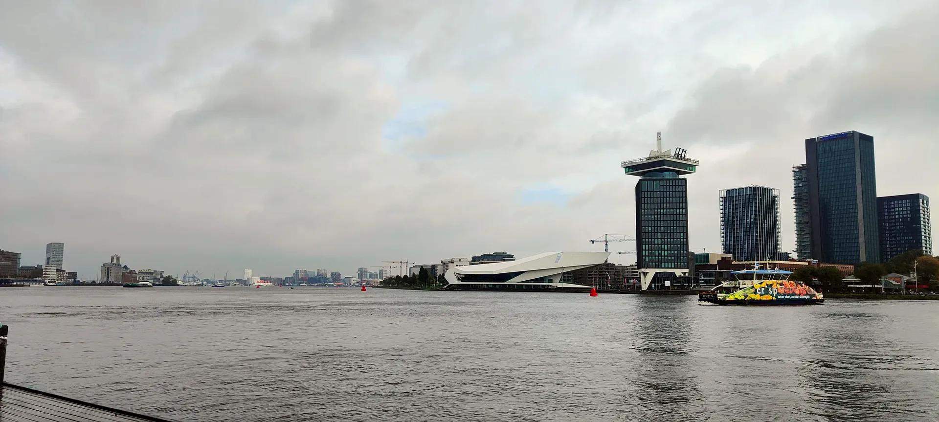 the eye and the a'dam tower across the ij