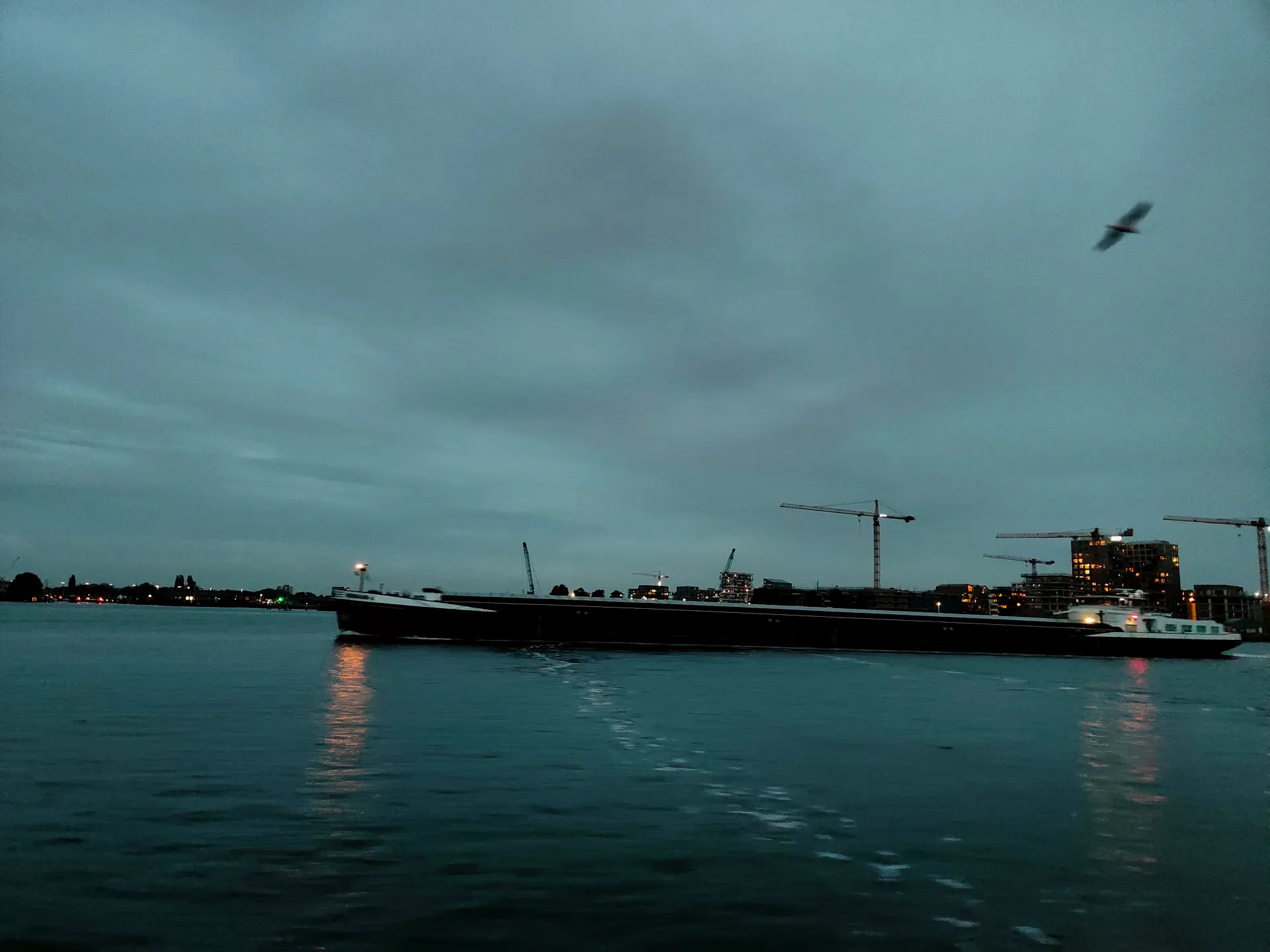 a barge crossing the ij