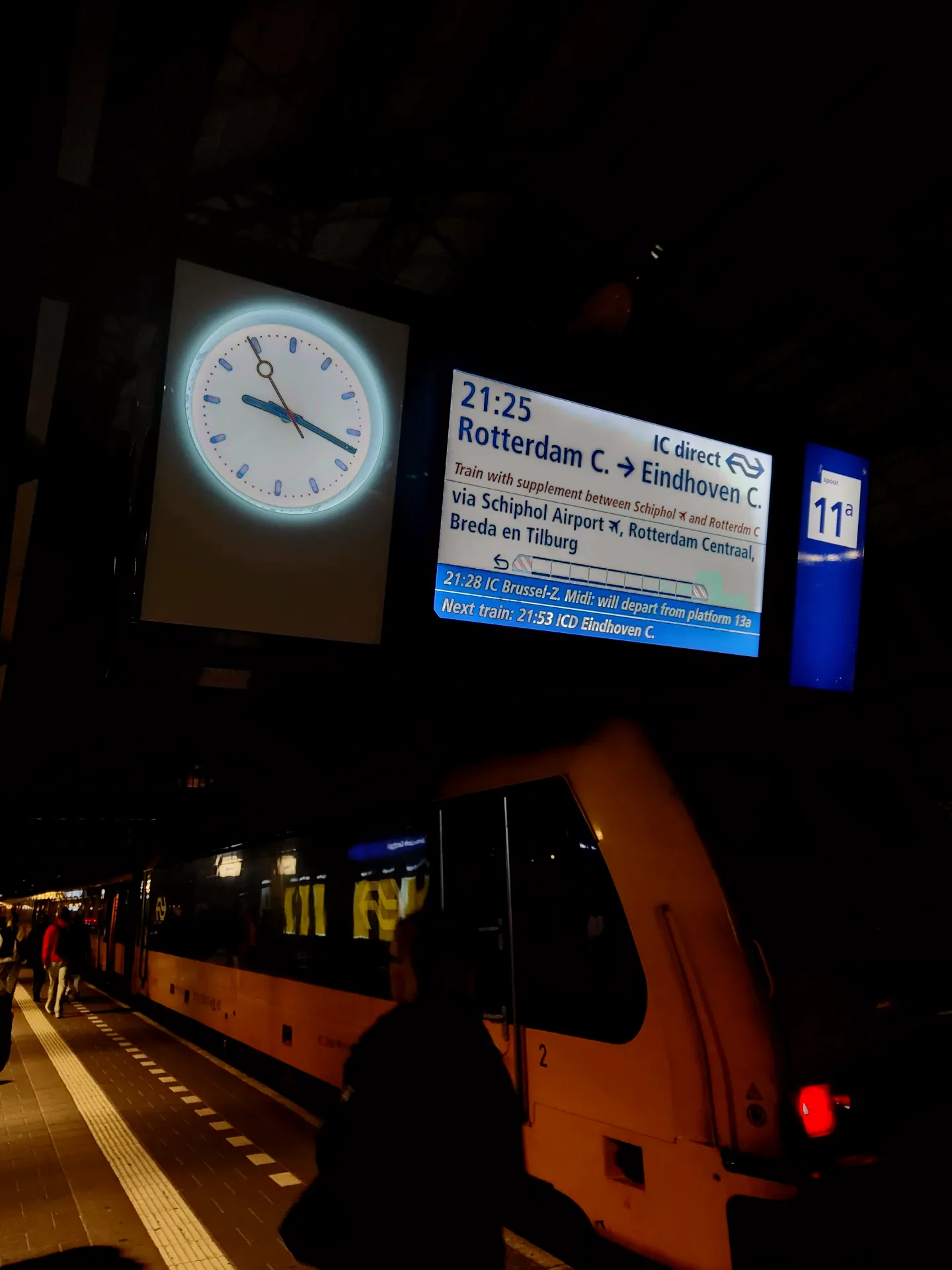 the platform clock, a yellow train, and the way home