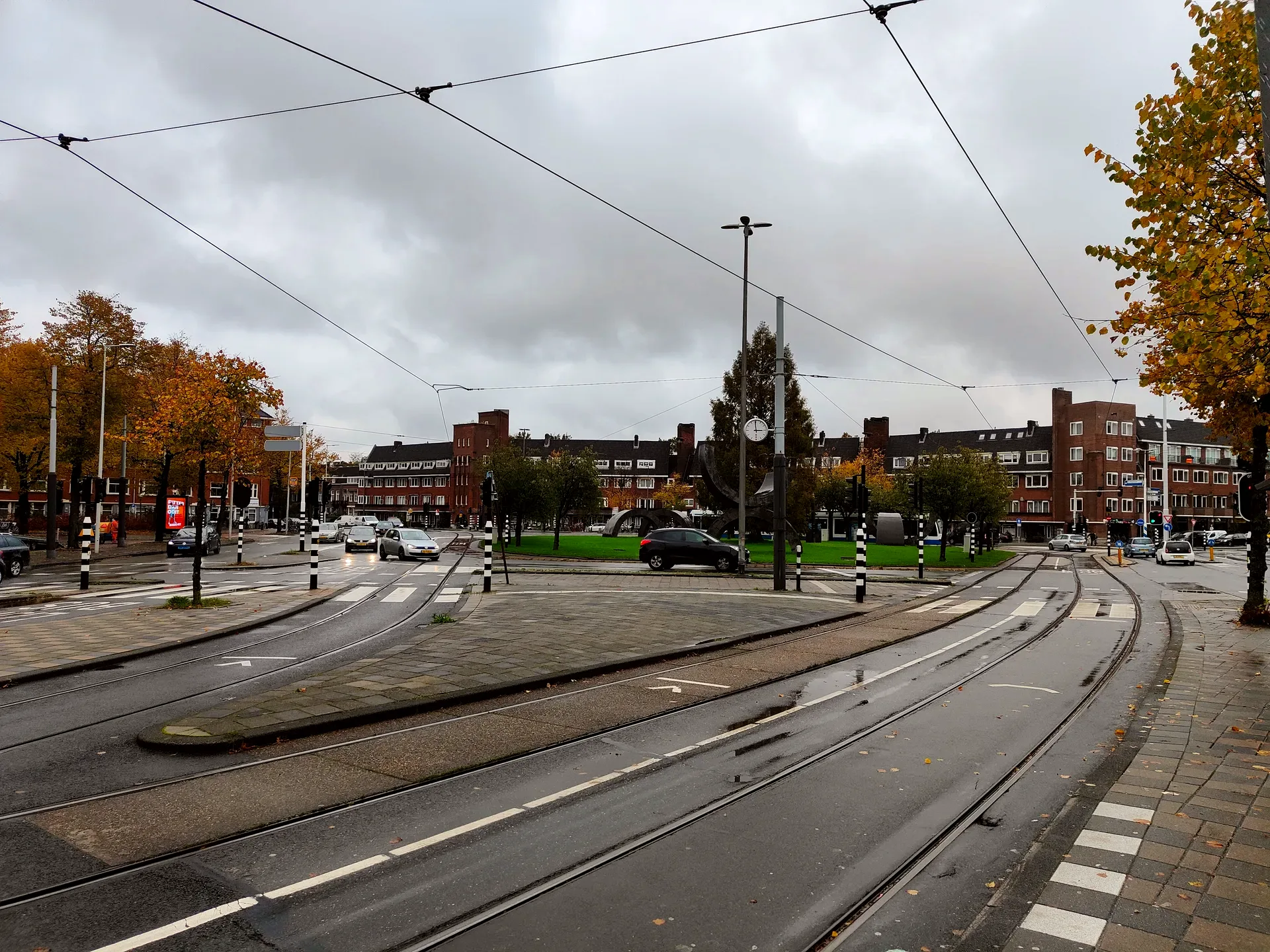 tram tracks at surinameplein, slick with rain