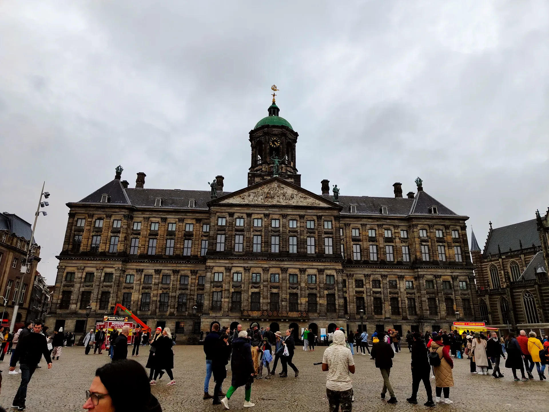 the royal palace under a grey dam square sky