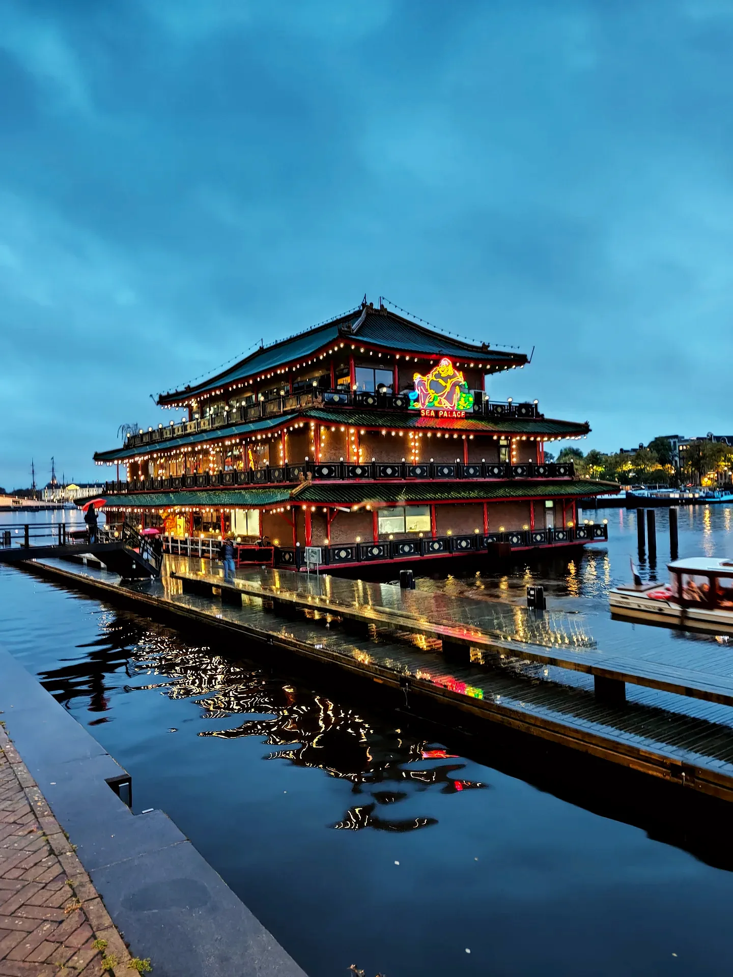 the sea palace, a whole pagoda afloat on the oosterdok at blue hour